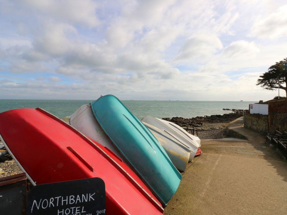 Boats on a shoreline with ocean views at Northbank Hotel in Seaview