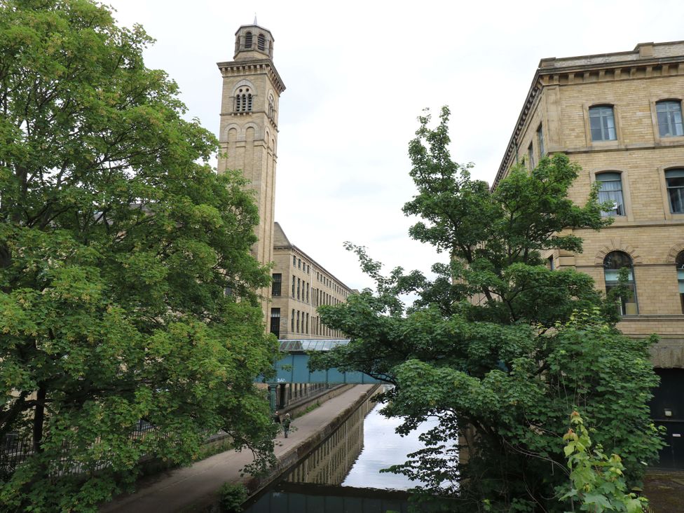 A view of a tower beside a canal at Saltaire House in Saltaire