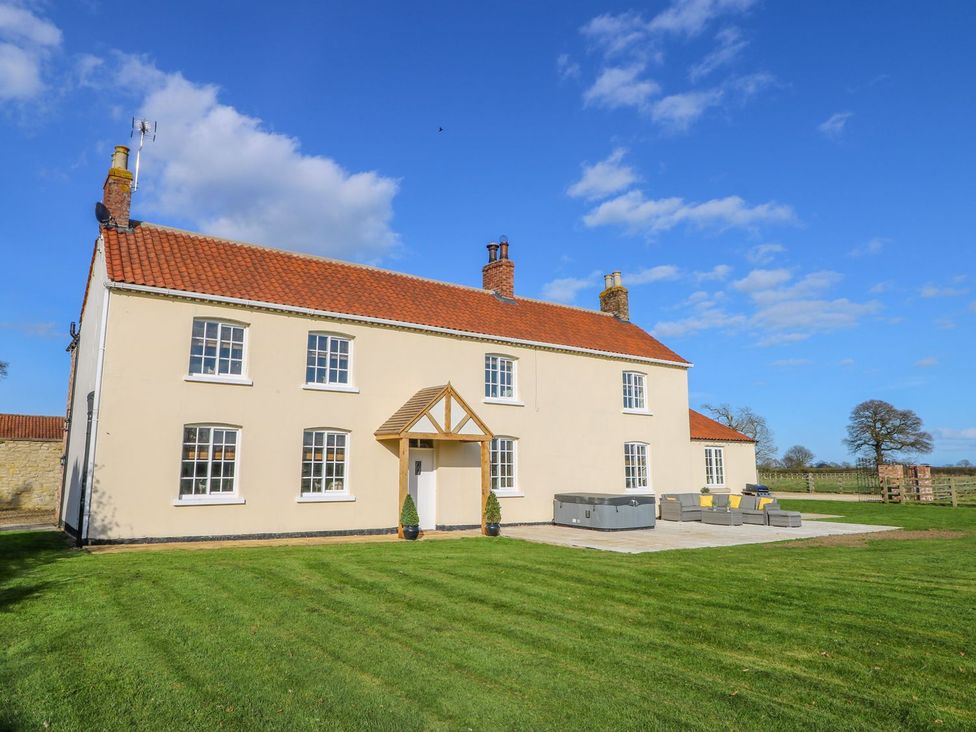 A house with patio furniture at Tuft House in Hovingham