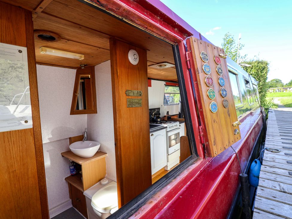 A bathroom with a sink and toilet at Escape II in Oakwood Marina