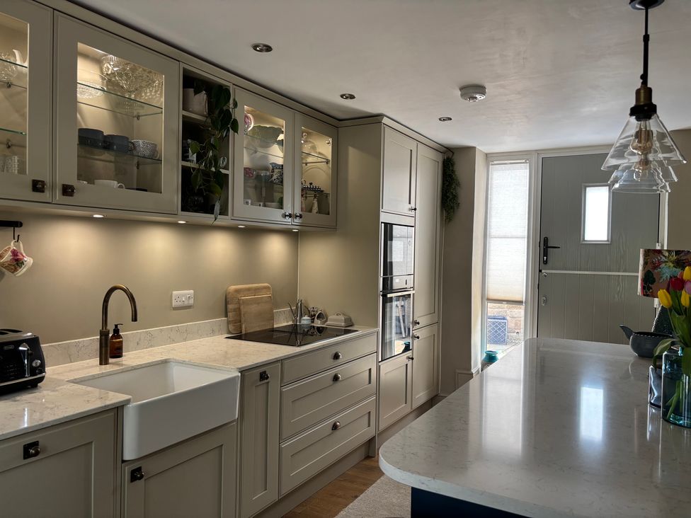 A kitchen with a countertop and sink at Holly Cottage in Totley