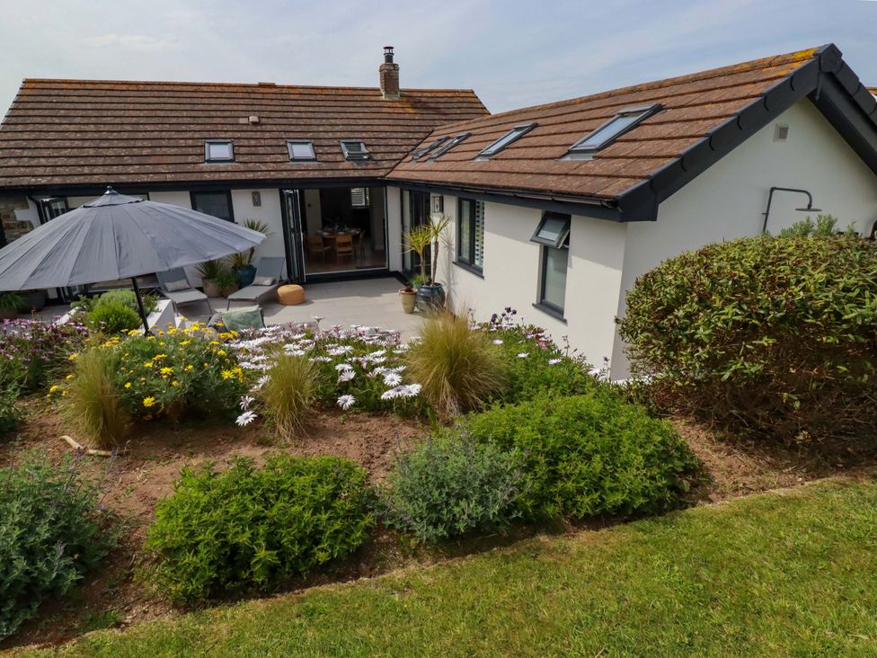 A house with garden and patio area at No.45 Whealgolden Drive Newquay