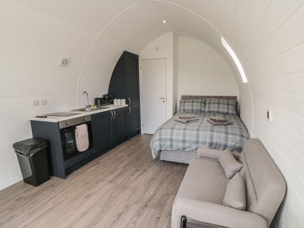 A studio apartment with kitchen and bed at Natures Nest in Malton