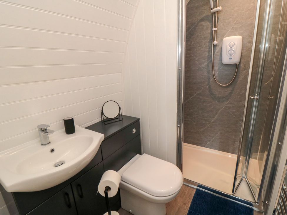 A bathroom with a sink and shower at Starlight Sanctuary in Malton