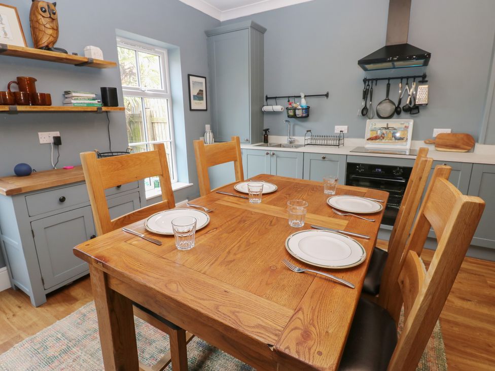 A kitchen with a dining table and chairs in 2 West View Richmond
