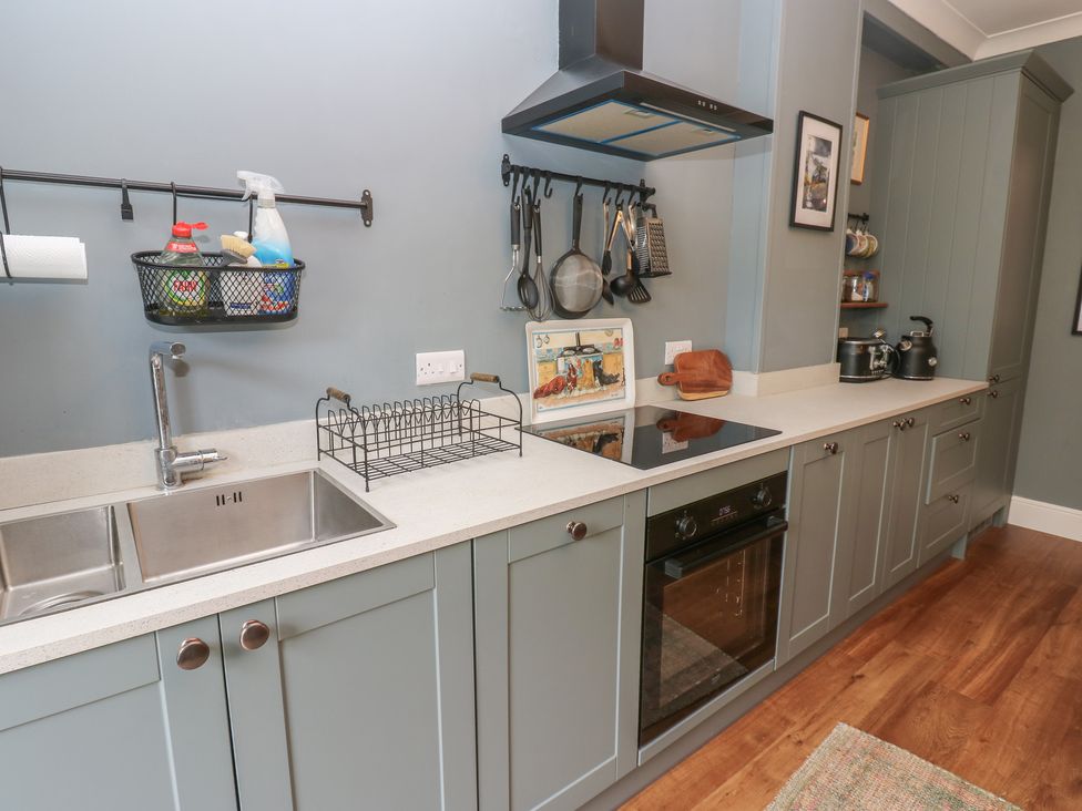 A kitchen with a sink and oven at 2 West View in Richmond