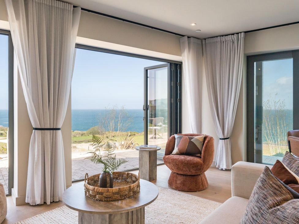 A living room with a sea view at tbc in St. Ives