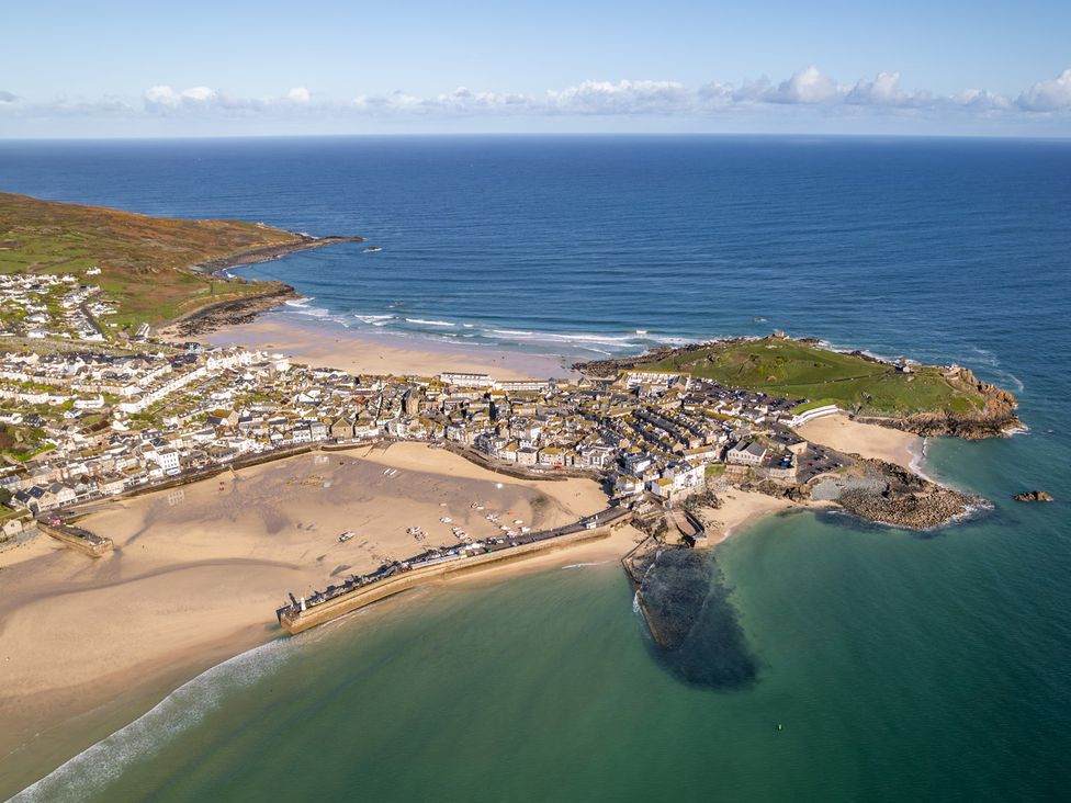 An aerial view of a coastal town with a beach and sea at Hidden 17- Lookout Terrace Hot Tub St Ives