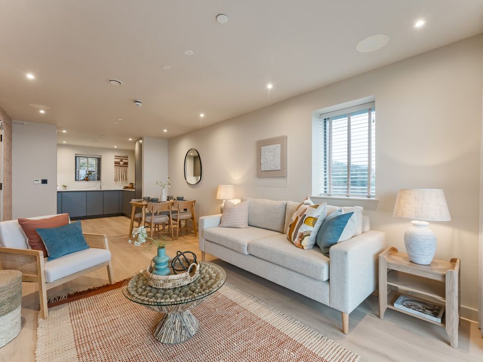 A living room with a sofa and coffee table at tbc in St. Ives