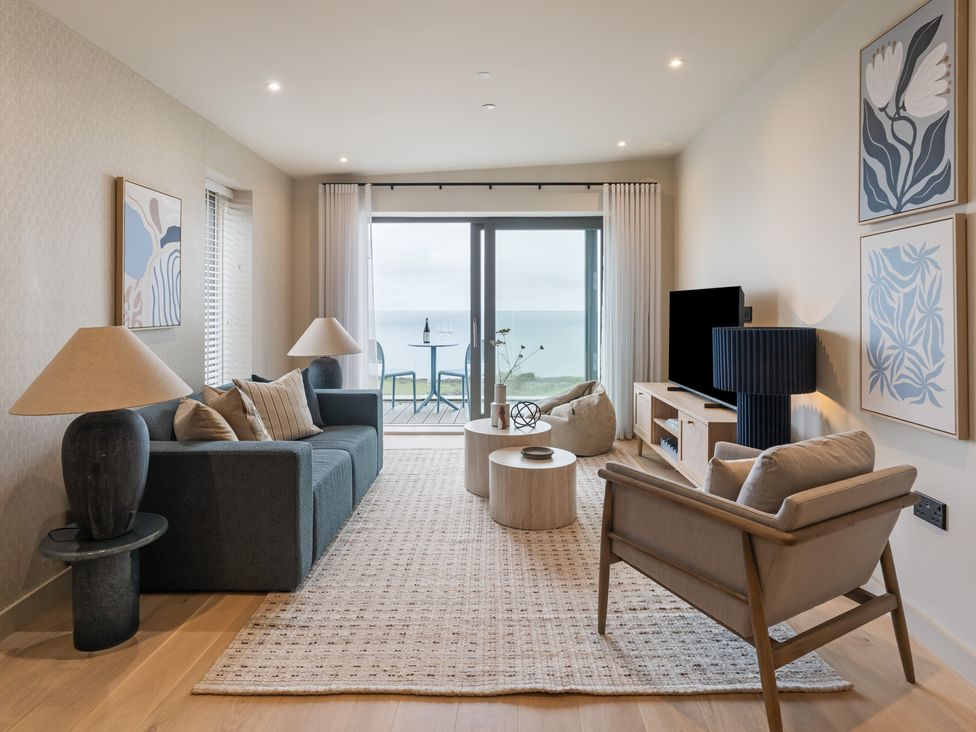 A living room with a sofa and a coffee table at tbc in St. Ives