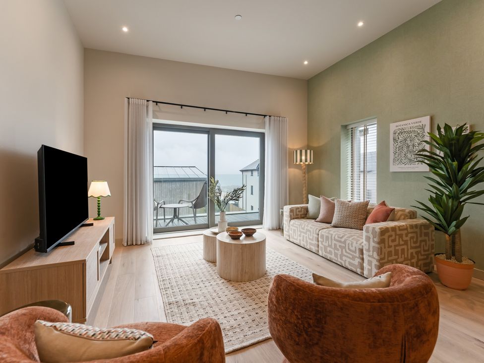 A living room with a sofa and coffee table at tbc in St. Ives