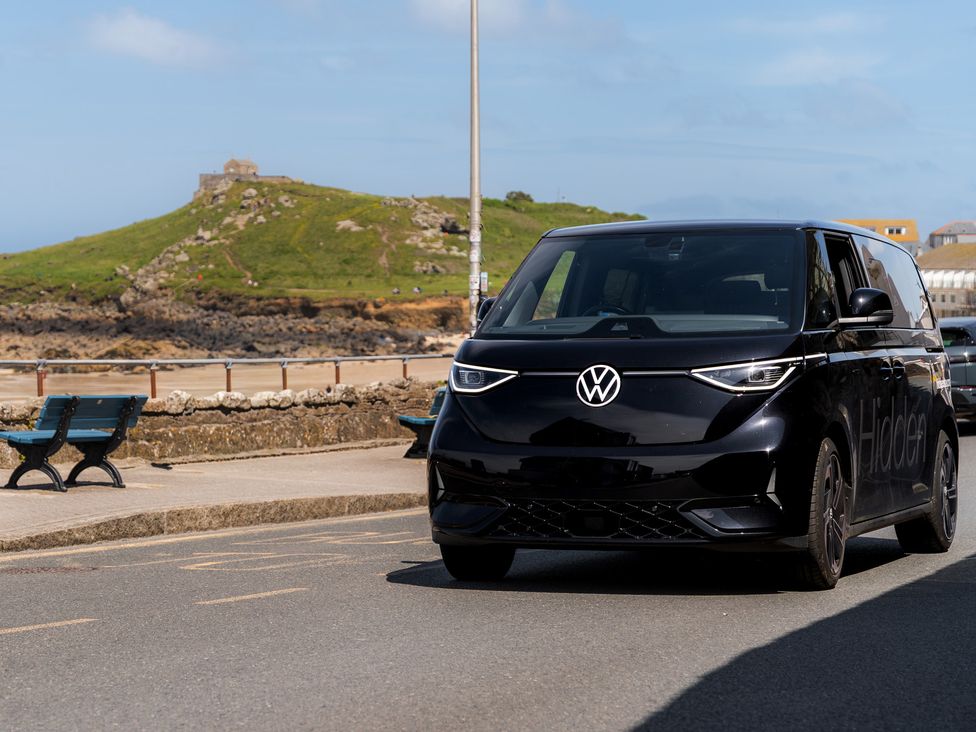 A car parked beside the road near a mountain at Hidden 14- Garden Terrace in St Ives
