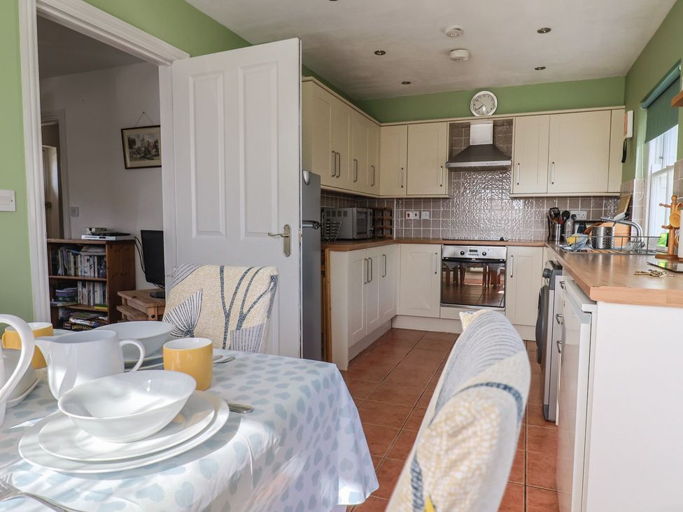 A kitchen with table and chairs at Morpeth in Combe St Nicholas