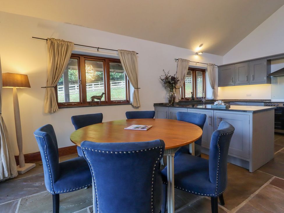 A kitchen with table and chairs at Sandy Gate in Knaresborough