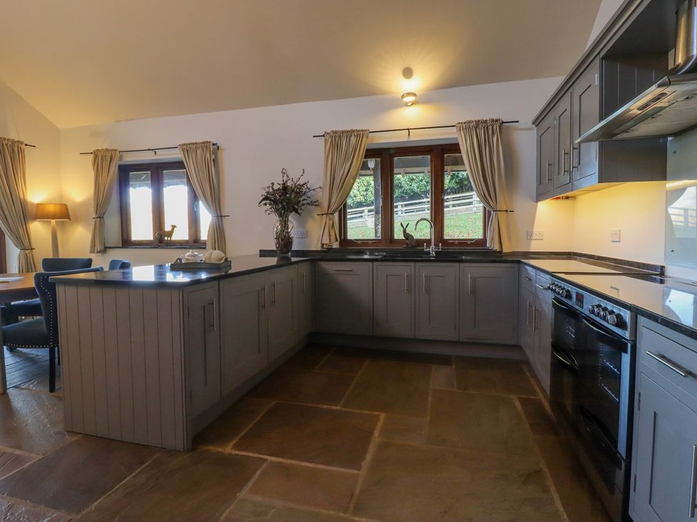 A kitchen with a sink and stove at Sandy Gate in Knaresborough