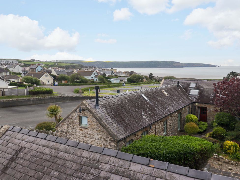 View of houses and coastline at No.8 Millmoor Farm Cottage in Broad Haven