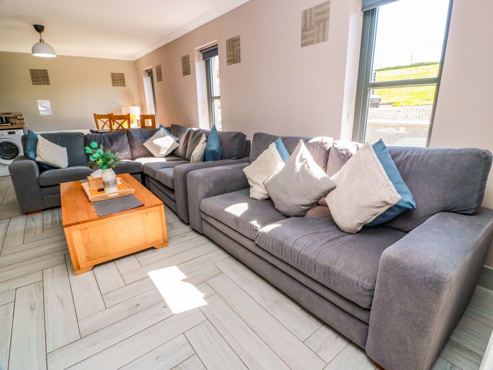 A living room with sofas and a coffee table at Ballaganlea in Alexandria
