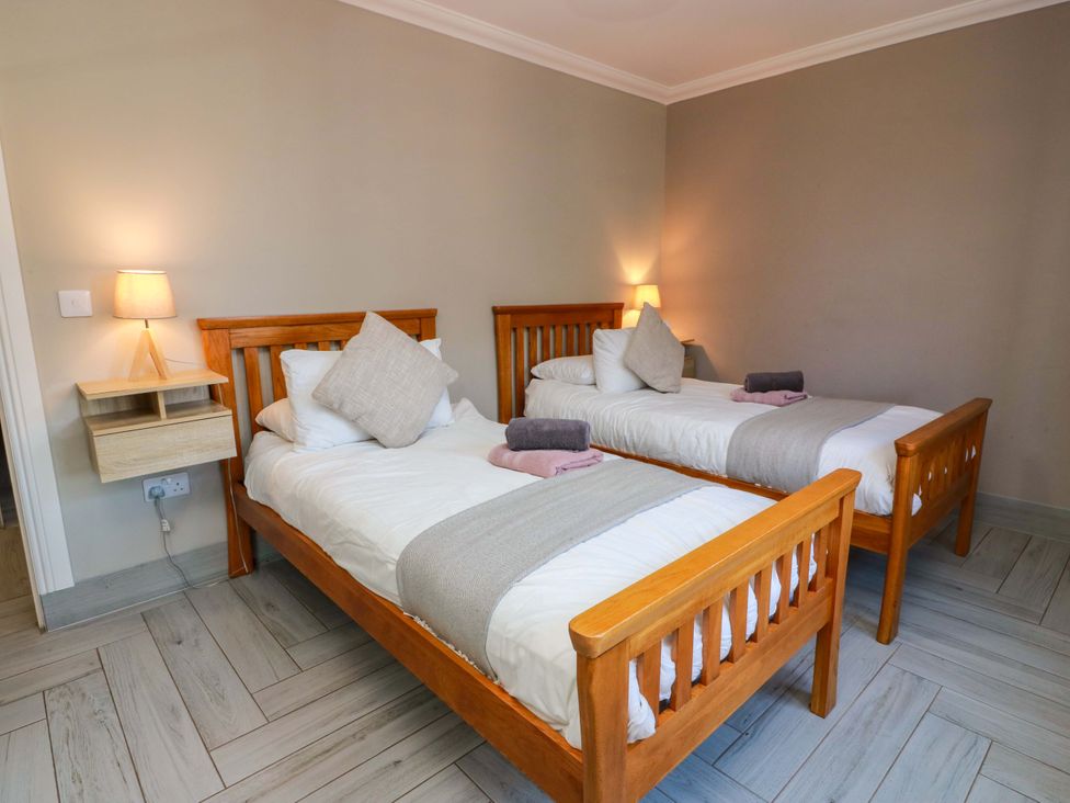 A bedroom with two single beds at Ballaganlea in Alexandria