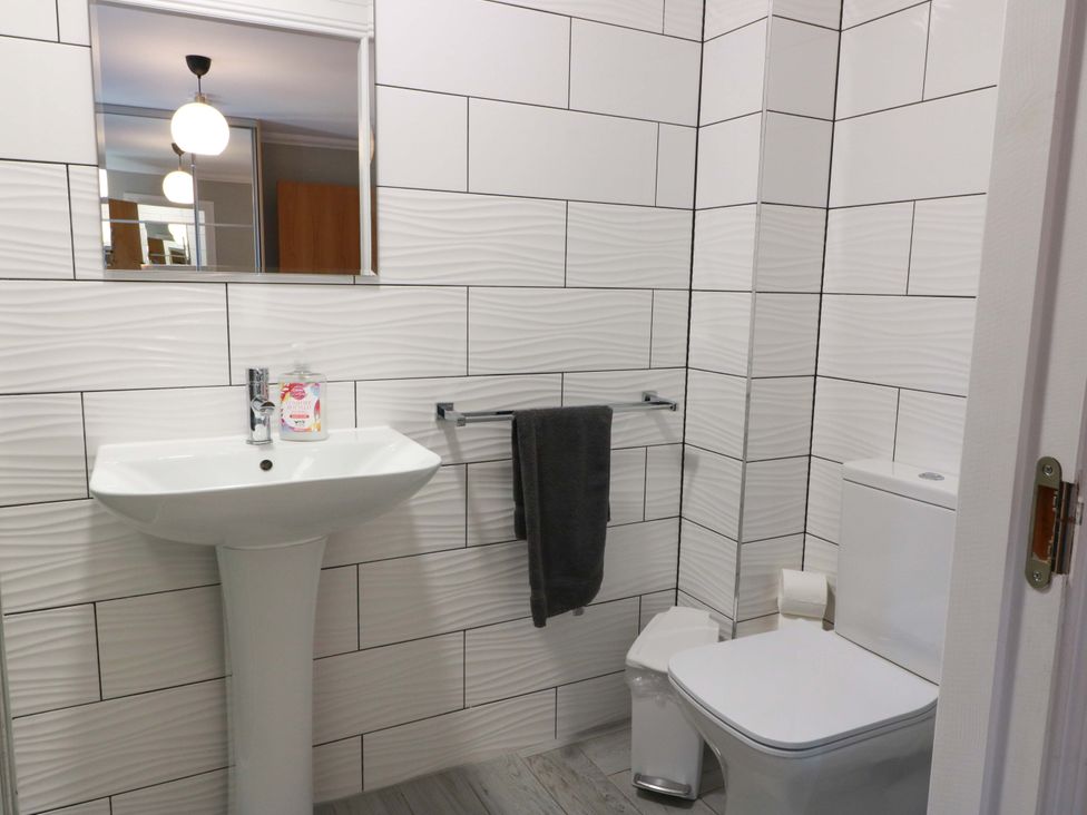 A bathroom with a sink and toilet at Ballaganlea in Alexandria