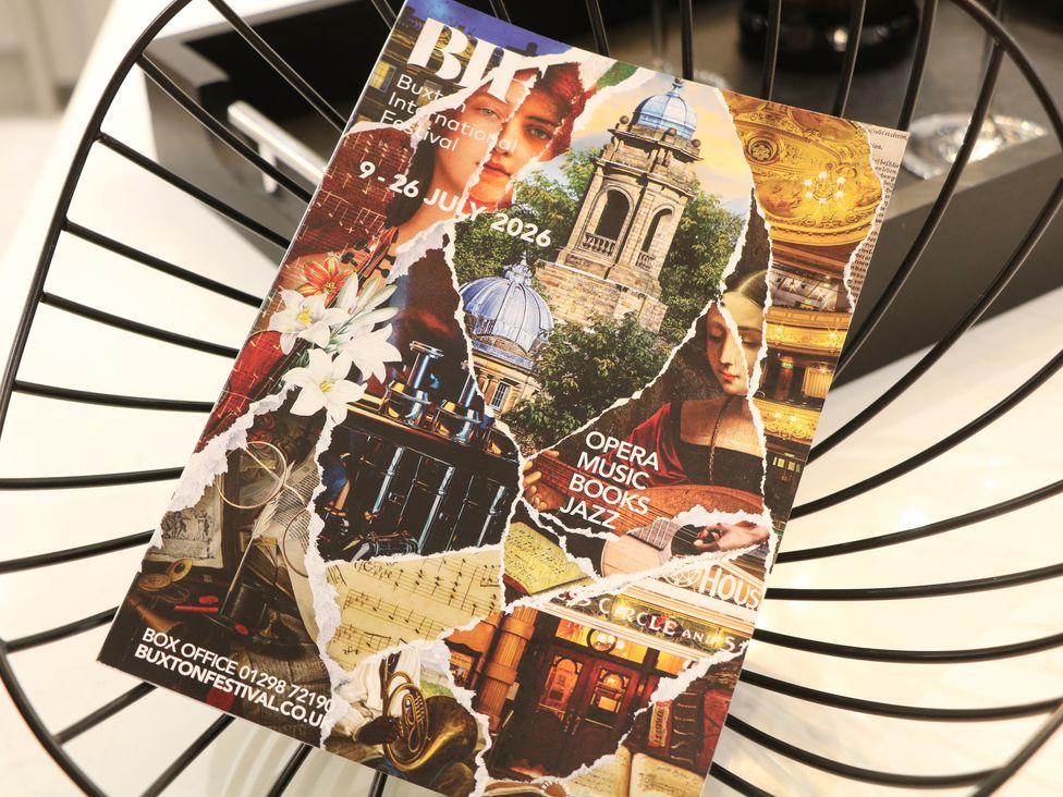 A brochure for Buxton International Festival on a table at The Loft Suite in Buxton