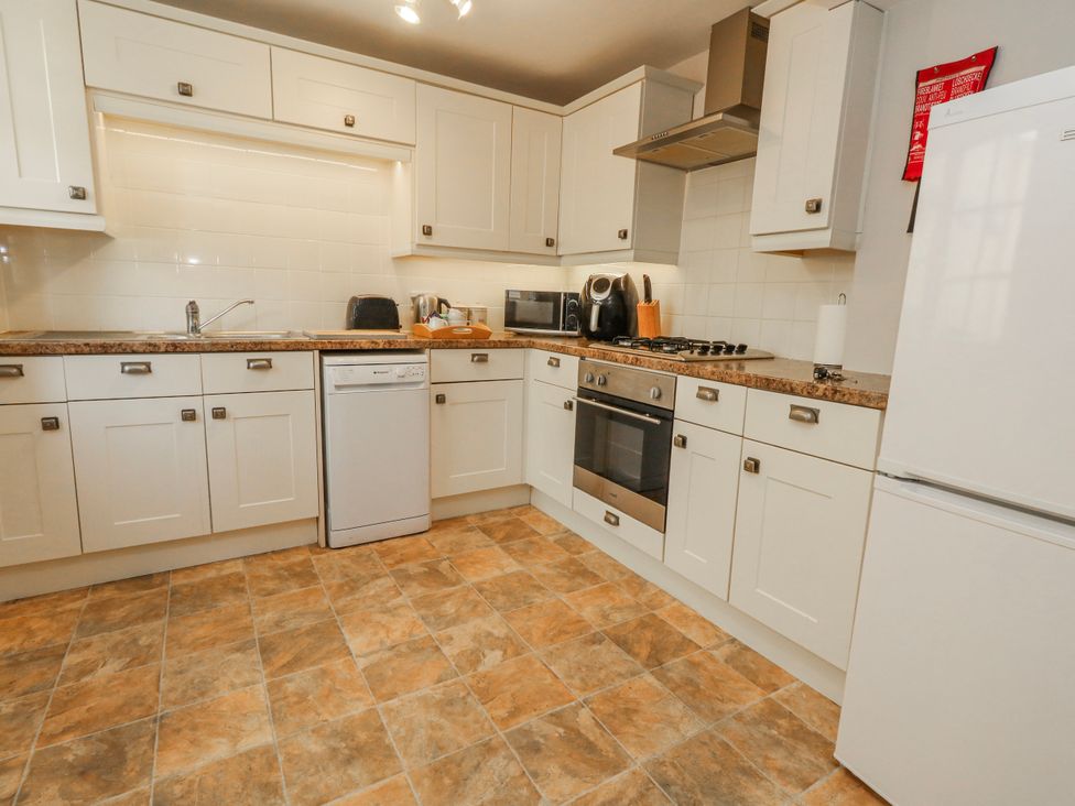 A kitchen with various appliances at 12 West Street Weymouth