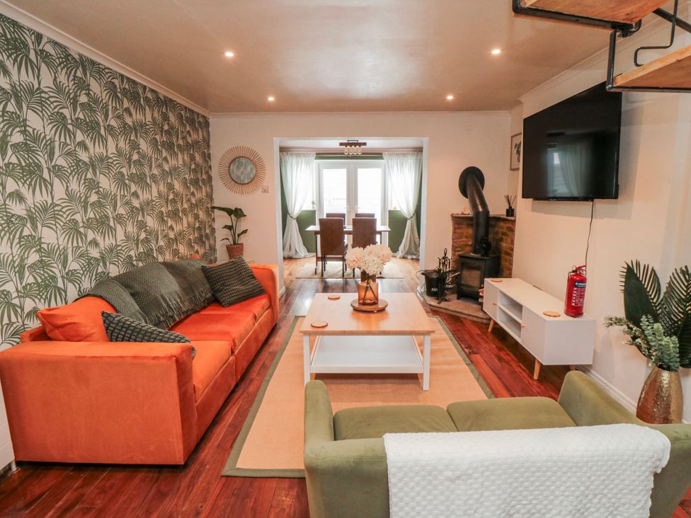 A living room with a sofa and coffee table at 3 Beck Mews in Scarborough