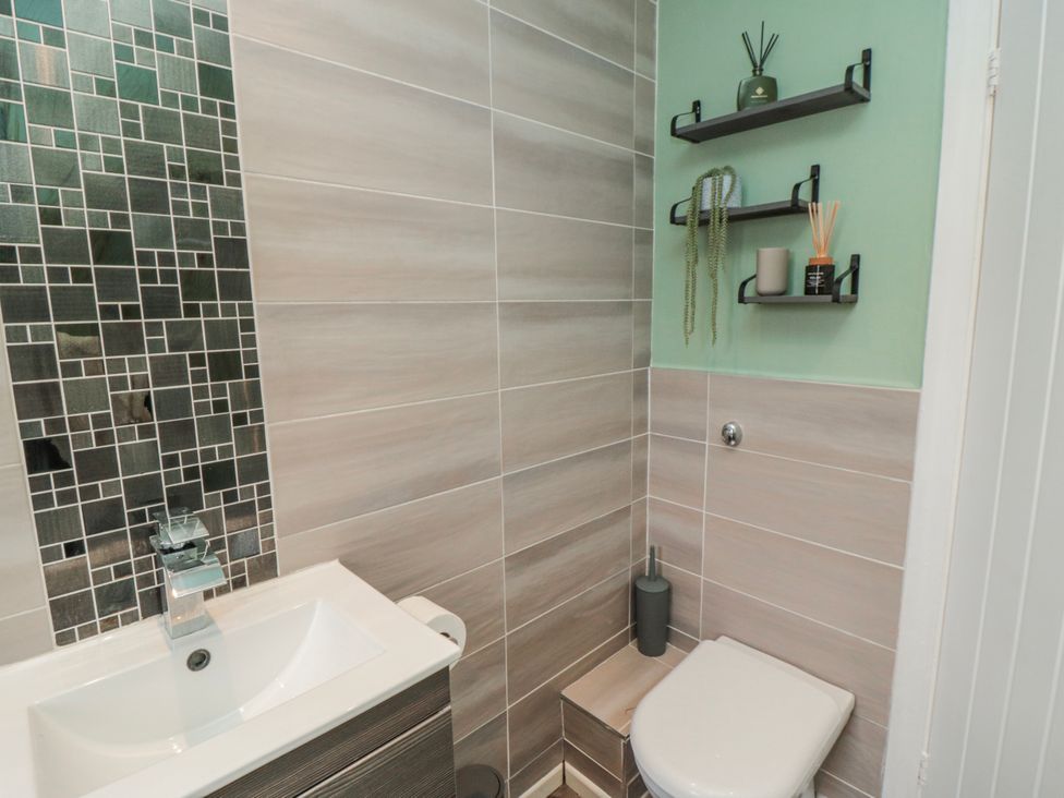 A bathroom featuring a sink and toilet at 3 Beck Mews Scarborough