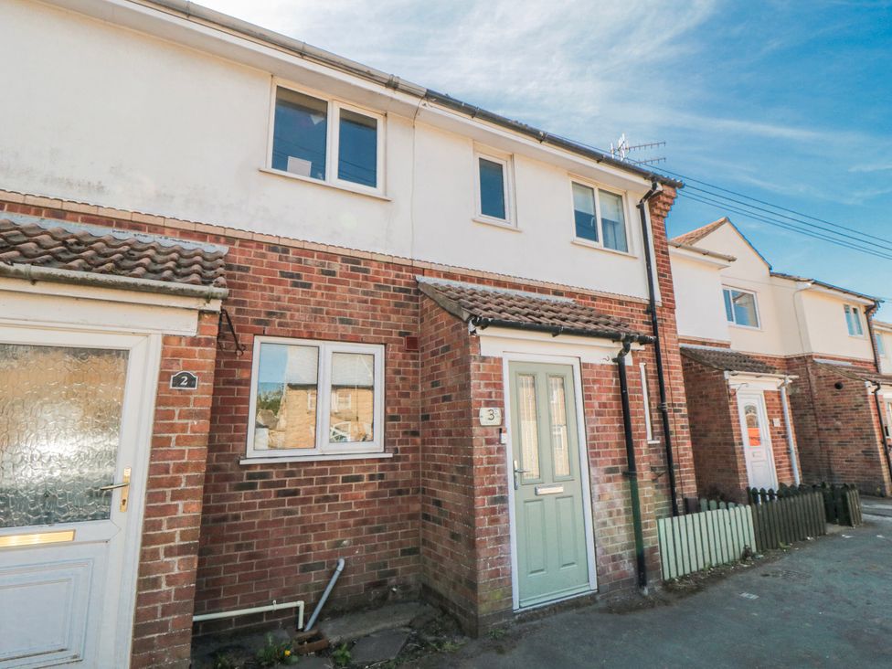 A house exterior with doors and windows at 3 Beck Mews in Cayton