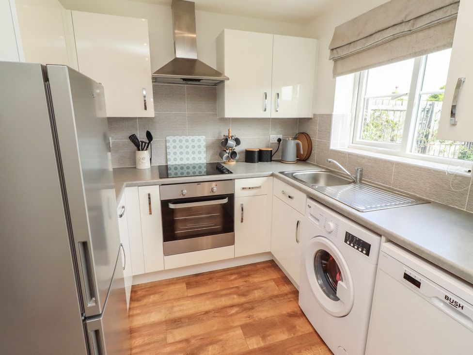 A kitchen with appliances and countertops at 26 Field Court 