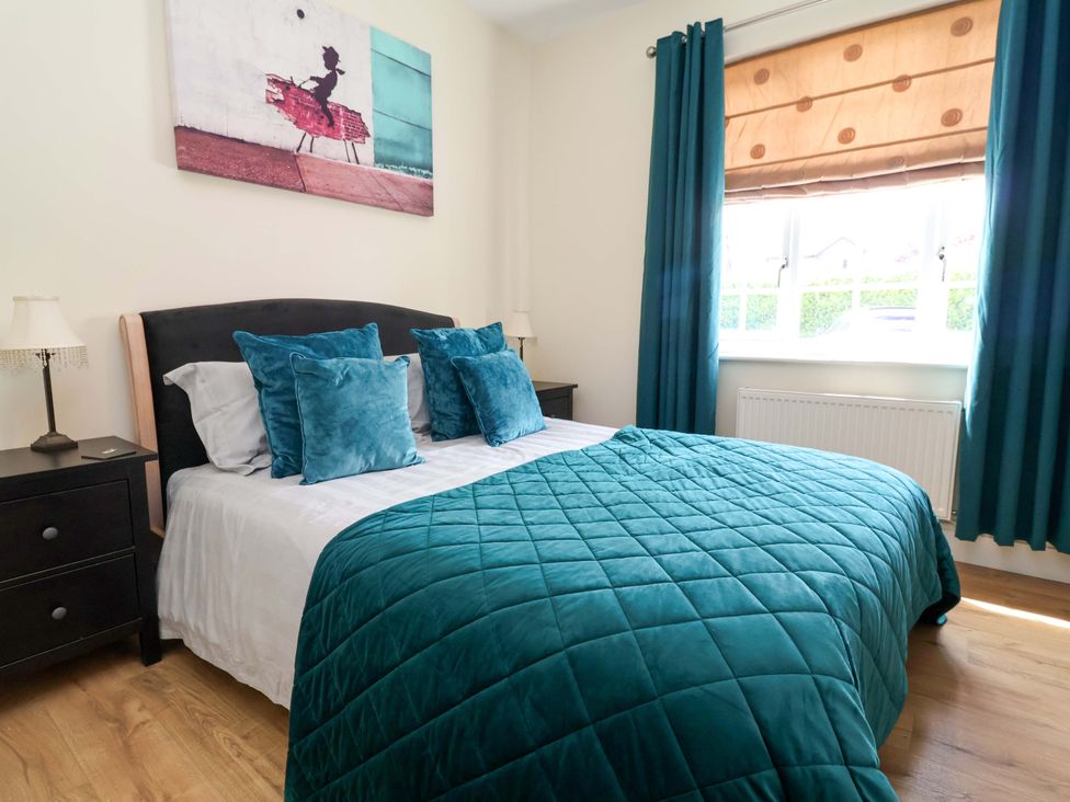 A bedroom with a bed and bedside table at 18 Crewe Road in Crewe