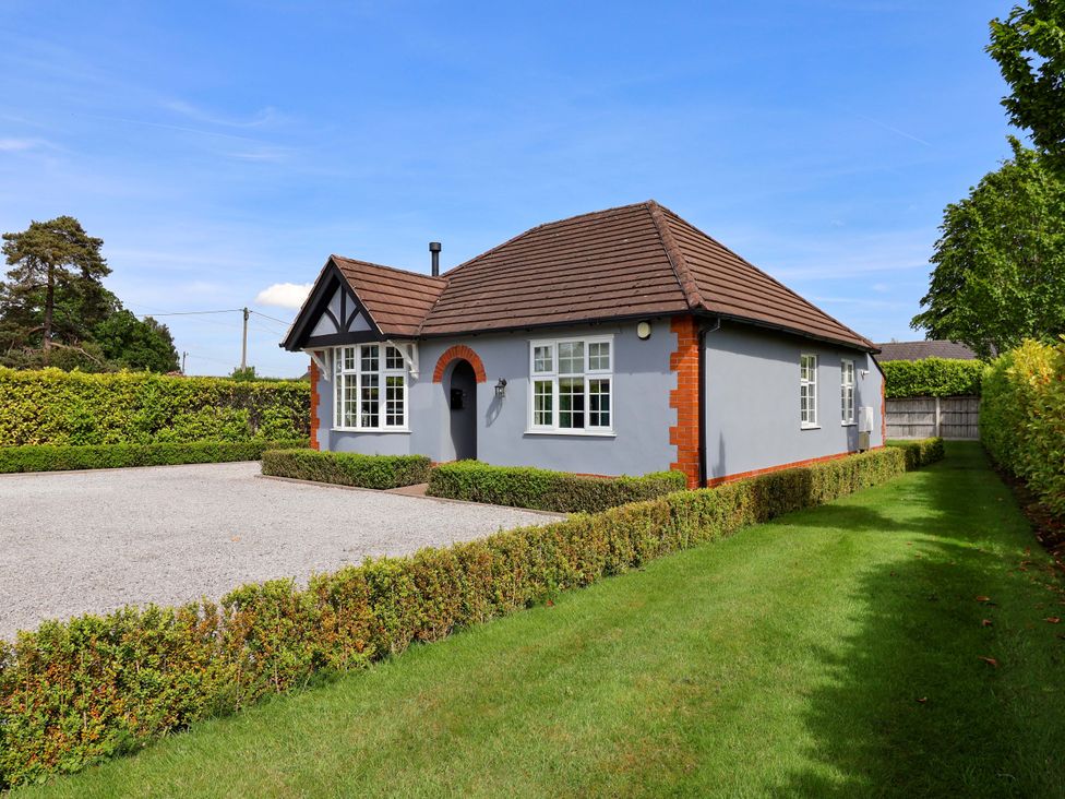 A house with a garden and driveway at 18 Crewe Road in Crewe