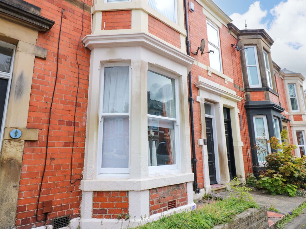 A front exterior view of a house with window and door at 17 Fairfield Road 