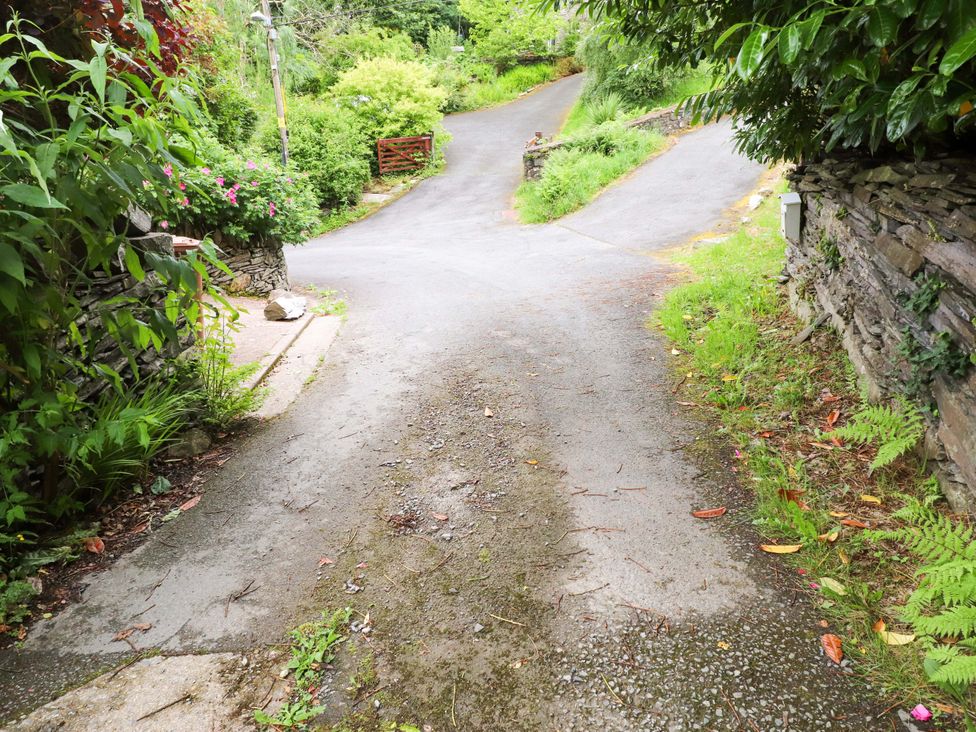 A pathway splitting into two directions at 2 Bryn Eglwys Prenteg