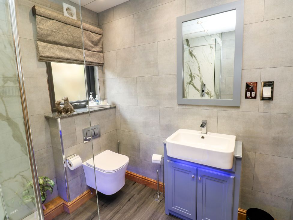 A bathroom with a sink and toilet at Caesars Lodge in Houghton Bank near Heighington