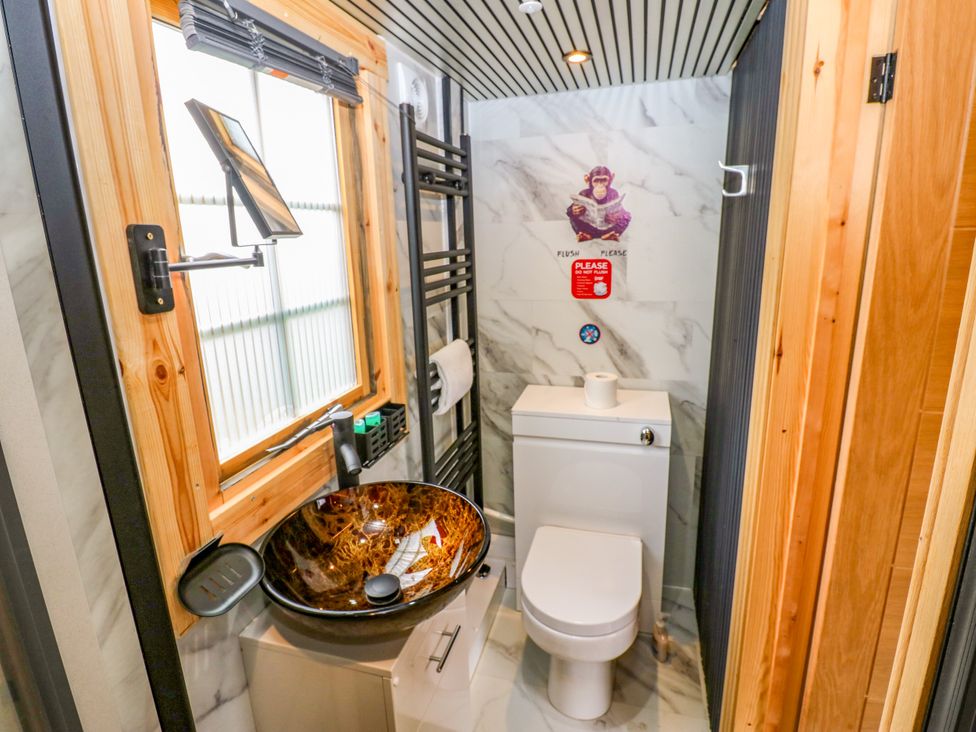 A bathroom with a sink and toilet at Black River in Houghton Bank near Heighington