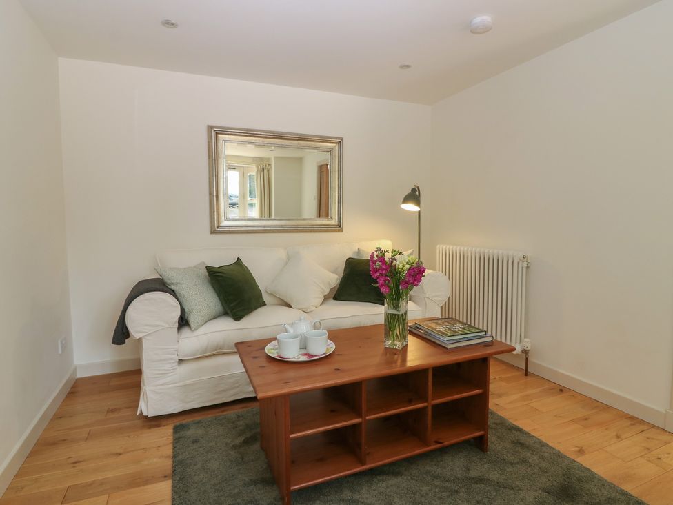 A living room with a sofa and coffee table at Hollybank Barn near Melrose