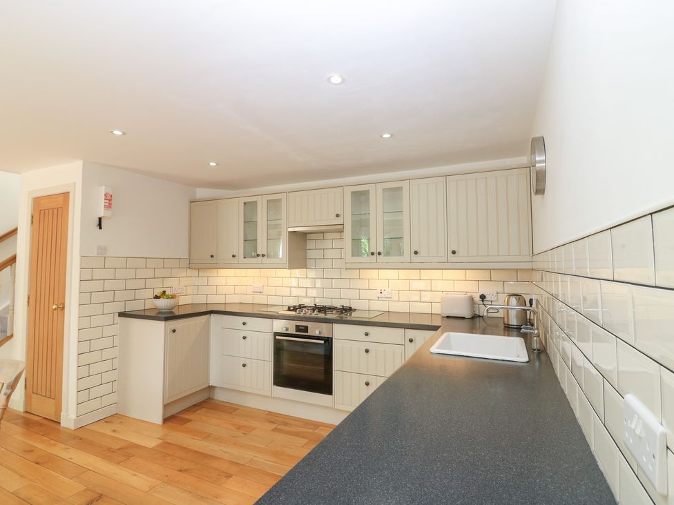 A kitchen with cabinets and appliances at Hollybank Barn near Melrose