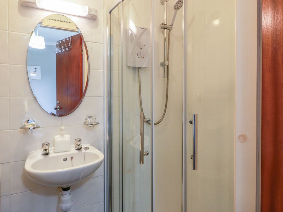 A bathroom with a sink and shower at Cliff View in Perth