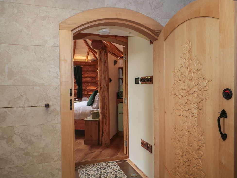 A doorway leading into a bedroom at Copper Suite in Chulmleigh