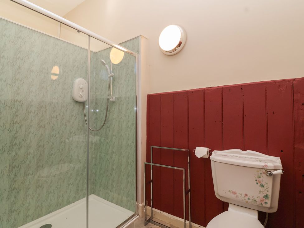 A bathroom with a shower and toilet at Harness Rooms in Gloucester