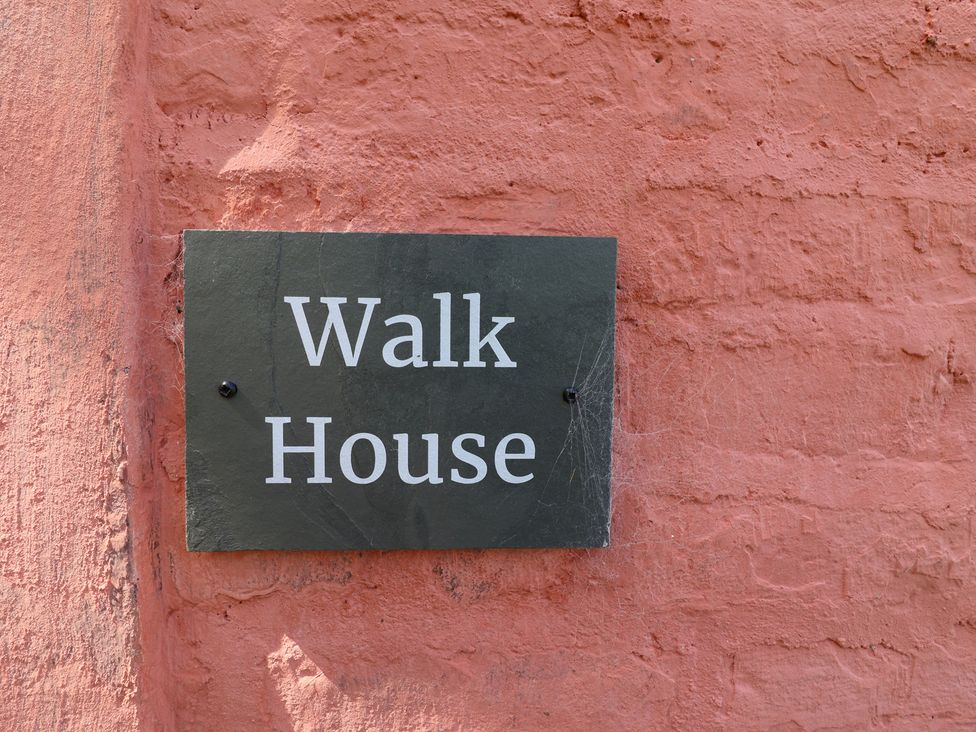 A sign that reads Walk House at Walk House in Gloucester