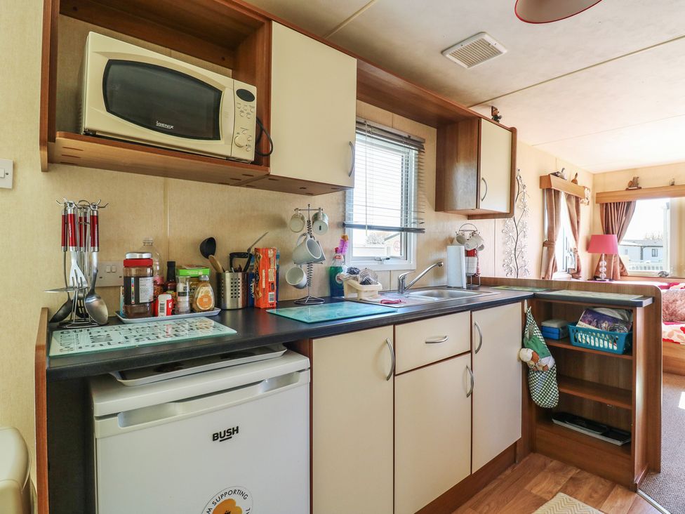 A kitchen with a microwave and sink at Valley Farm Number 448