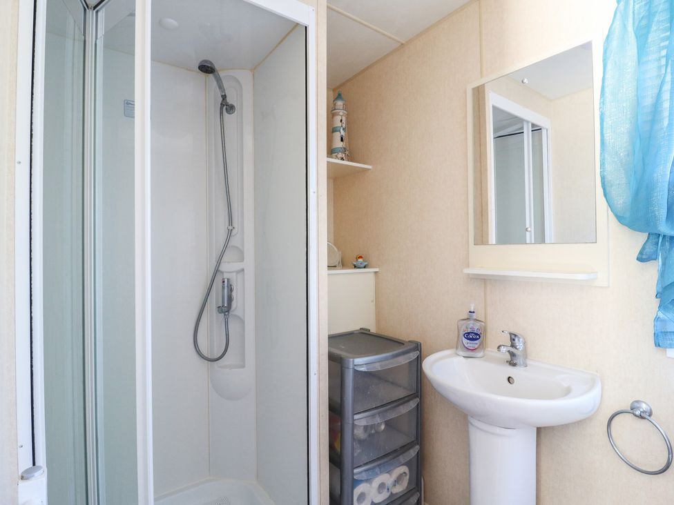 A bathroom with a shower and sink at Valley Farm Number 448