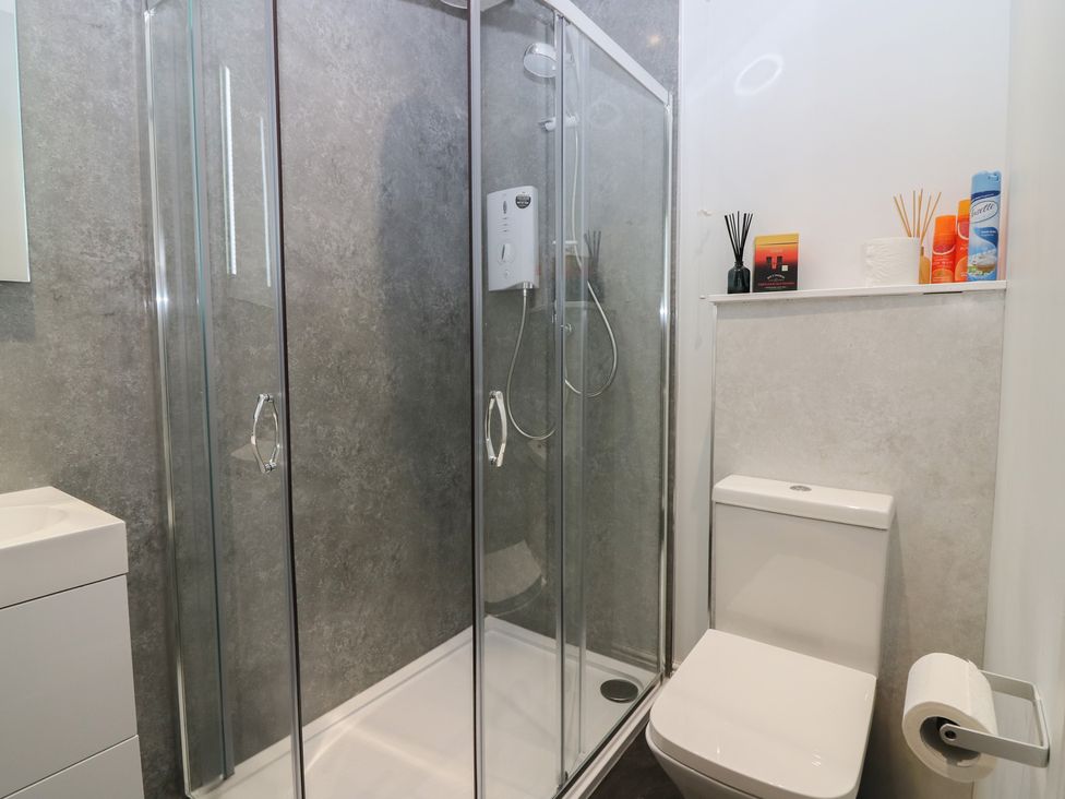 A bathroom with a shower and toilet at The Old School in Peebles