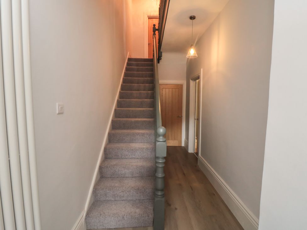 A staircase in a hallway at 5 Station Avenue