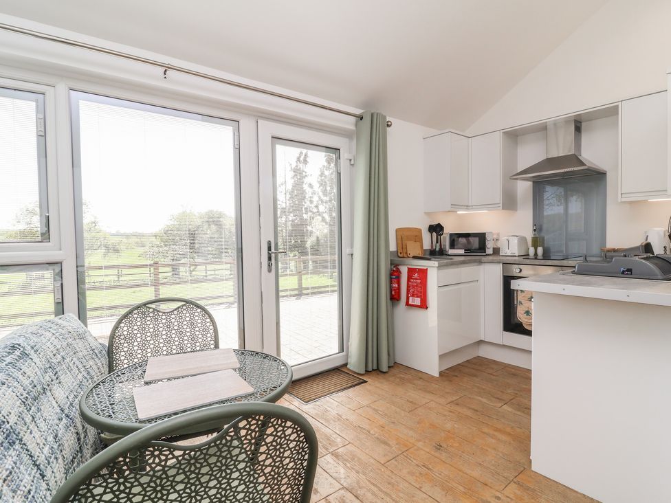 A kitchen with dining area at Willow in Barnstaple