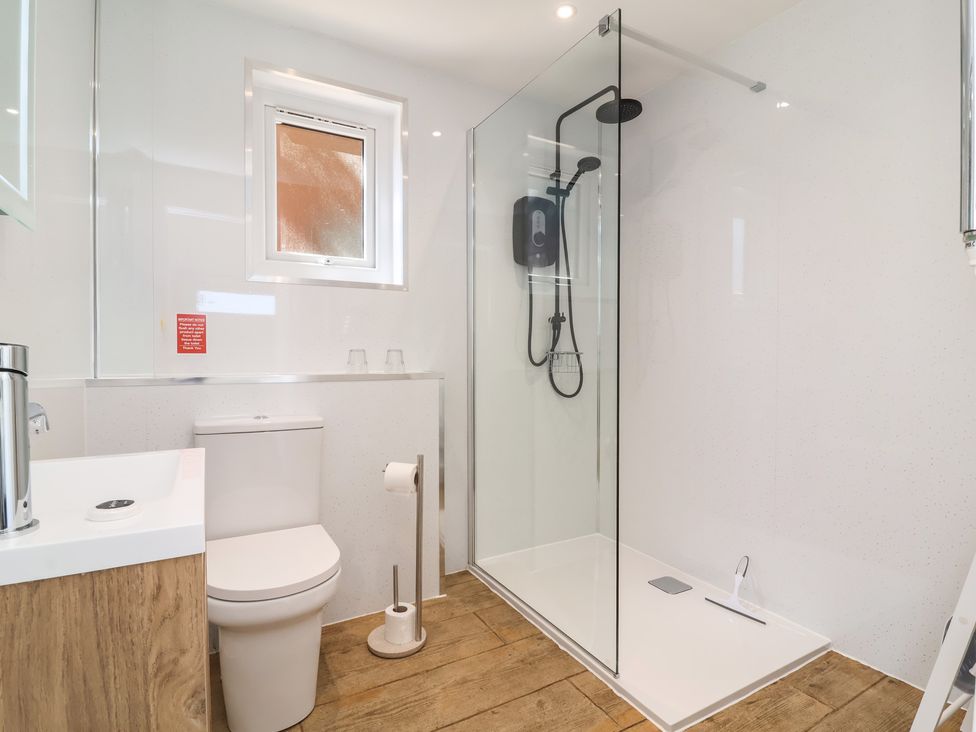 A bathroom with a shower and toilet at Willow in Barnstaple