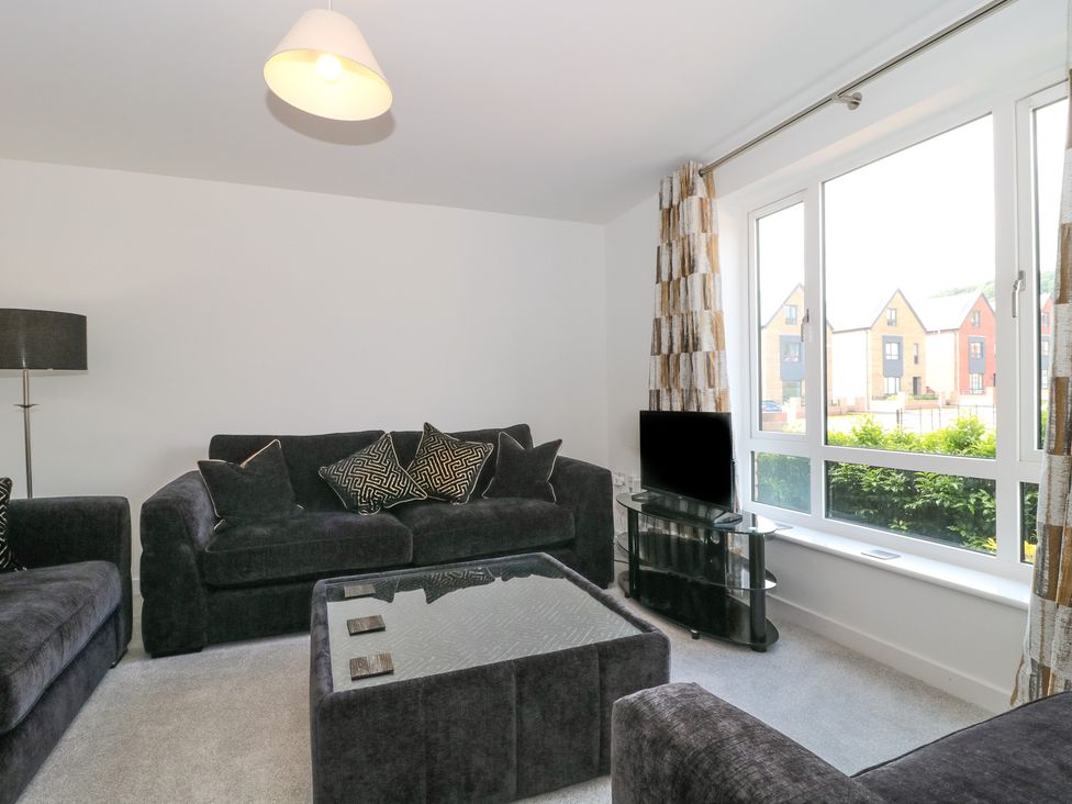 A living room with a sofa and coffee table at 56 Strothers Avenue Malvern