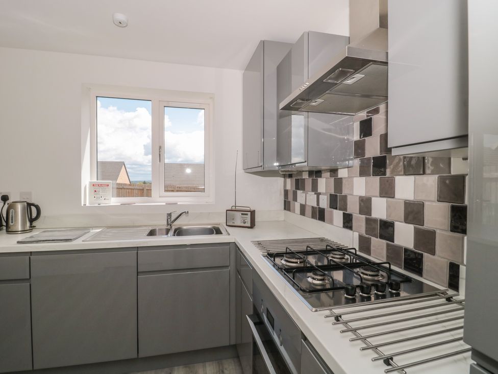 A kitchen with a sink and gas stove at 56 Strothers Avenue in Malvern