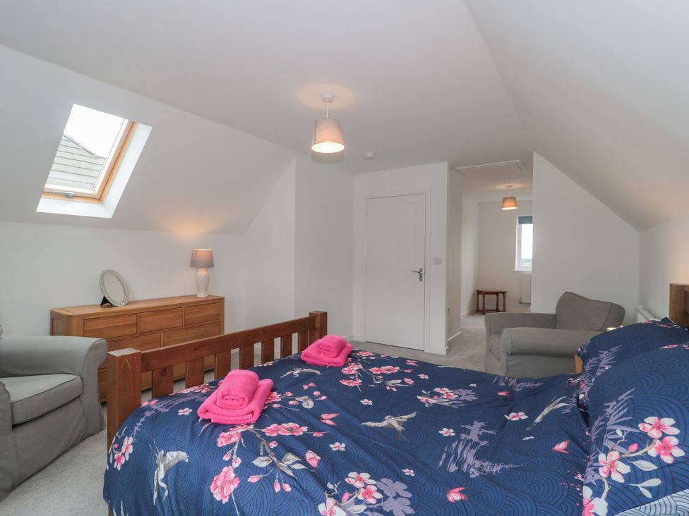 A bedroom with a bed and dresser at 56 Strothers Avenue Malvern